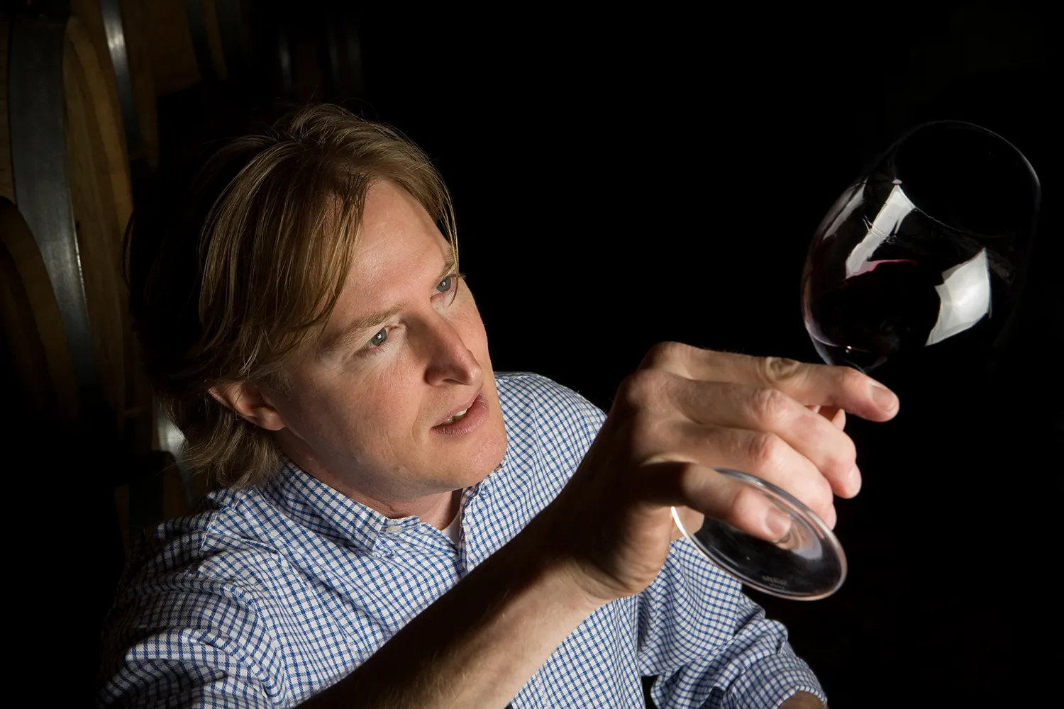 Brian holding a wine glass with Bumgarner Wine