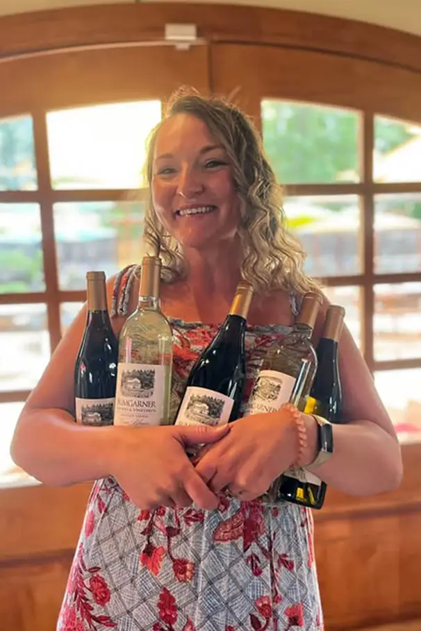 Brea clutching bottles